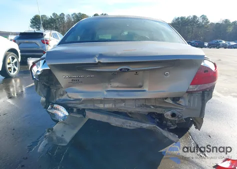 2004 Ford Taurus Se z USA, uszkodzony, nr VIN 1FAFP53U34G143514